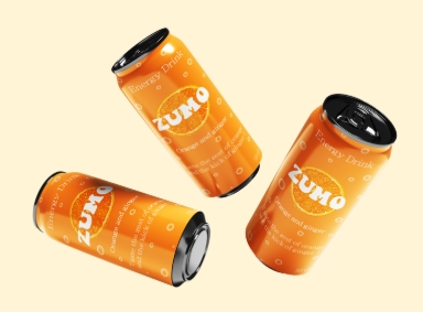 Trois canettes orange de la boisson énergisante Zumo